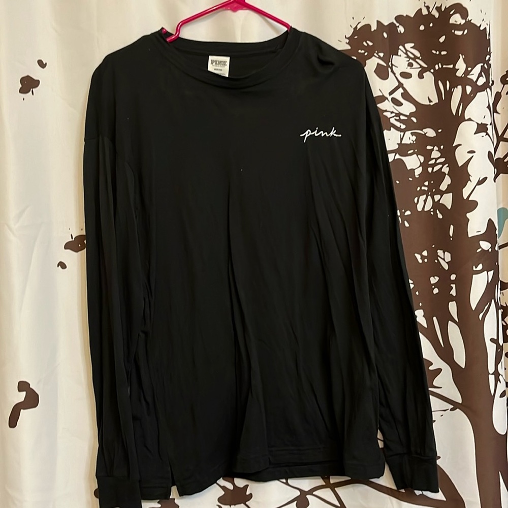 Pink shirt with silver sequins.